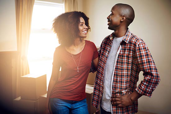 Young couple in new home