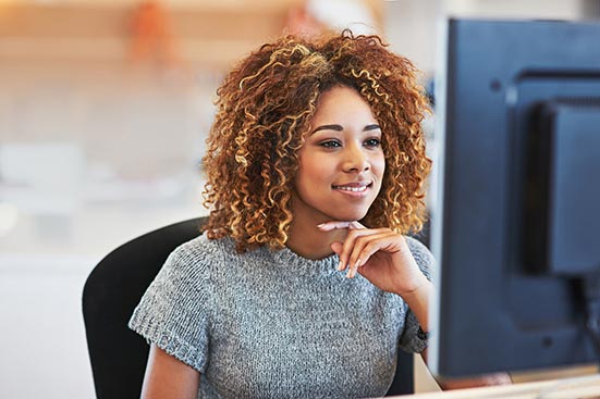 Woman using computer at work