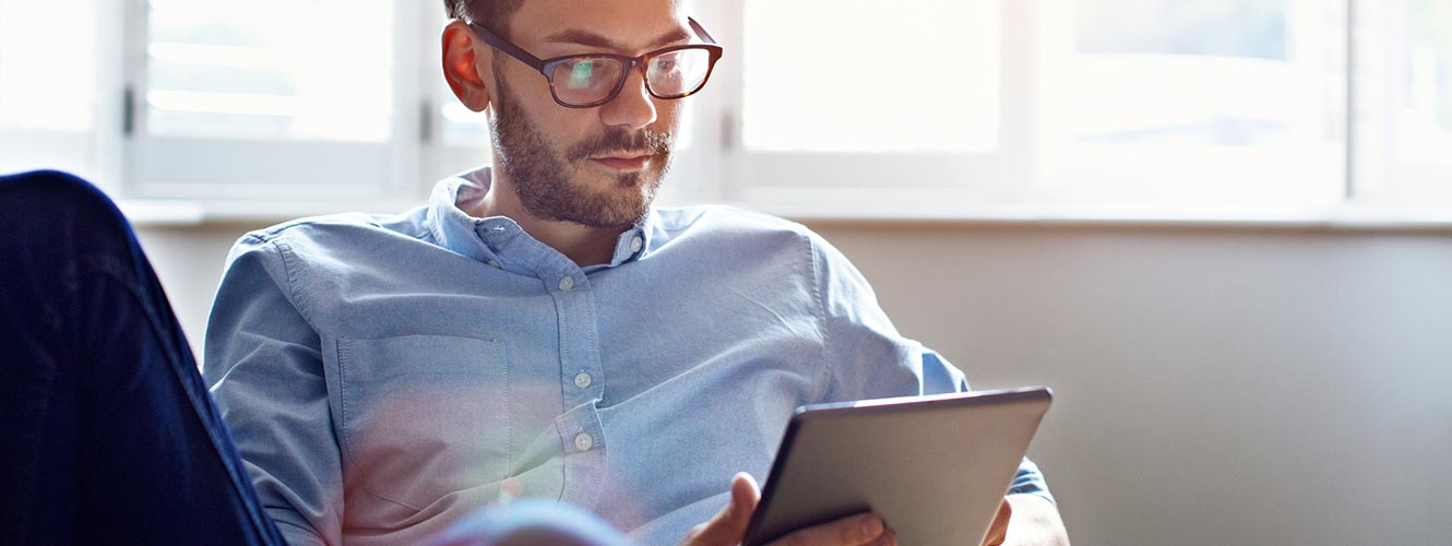 Young man using tablet