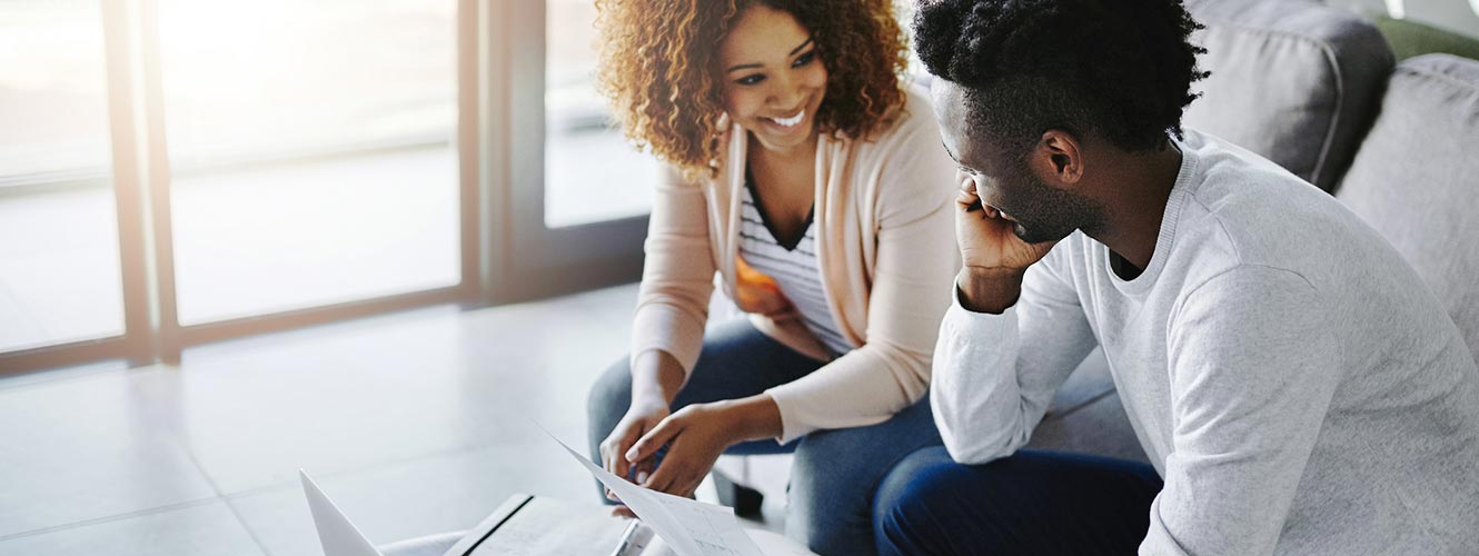 Young couple going over paperwork